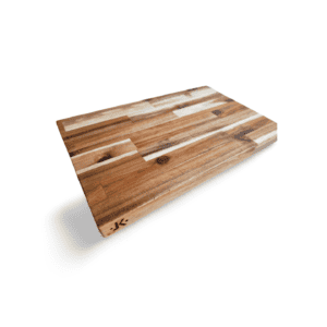 Acacia cutting board from the Artisan Series, size 12x18 inches, showcasing its smooth surface and beautiful wood grain.