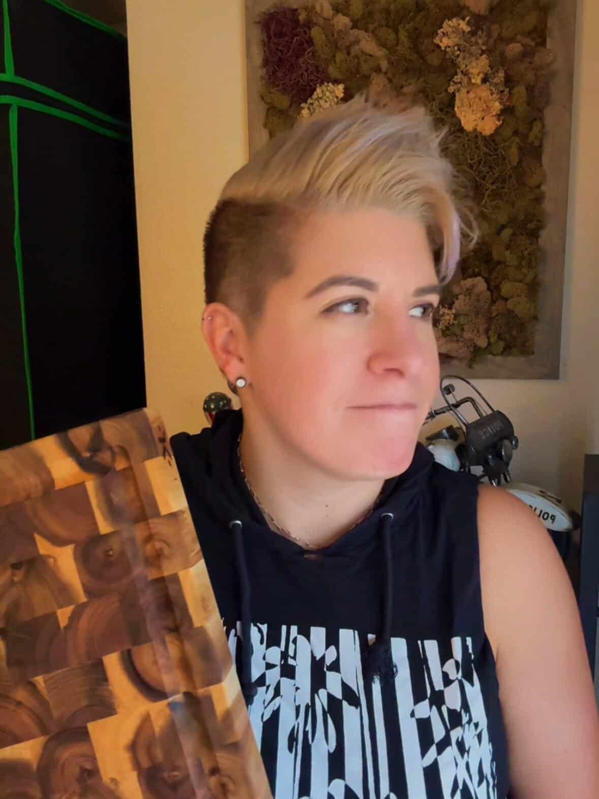 jada-kay-holding-cutting-board Jada Kay holding an end grain acacia wood cutting board